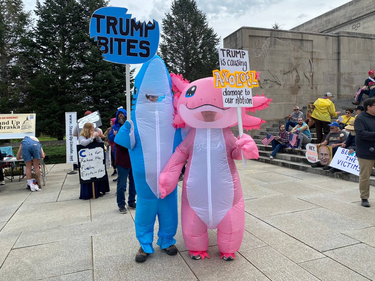 A shark and an axolotl walk into a protest